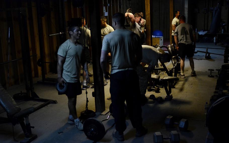 Soldiers with the 1st Battalion, 501st Infantry Regiment take advantage of down time by squeezing in a workout at Combat Outpost Sabari, Khost province. 