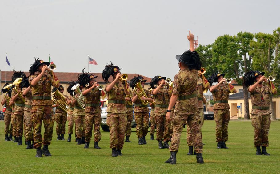 The Italian army’s 11th Reggimento Bersaglieri marching band sprinted into the ceremony playing music and then performed both national anthems at the U.S. Army Garrison Italy’s change of command ceremony on Hoekstra Field at Caserma Ederle in Vicenza, June 22, 2023. Later, they played the U.S. Army song.