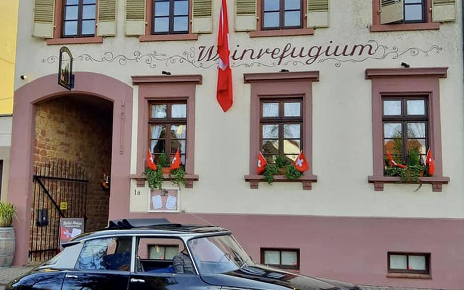 The Swiss House restaurant is located in an old residential building in Bad Duerkheim, Germany. It has outside seating in an enclosed garden, in addition to the Alpine-style interior rooms.