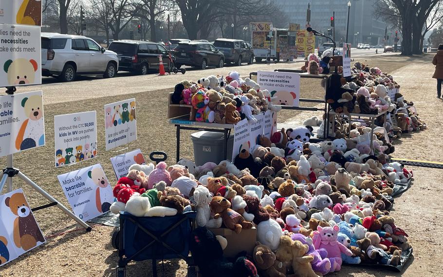 Mothers from West Virginia rally on the National Mall in February 2022 before meeting with lawmakers about expanding the Child Tax Credit program. Organizers placed 500 teddy bears, each representing 100 West Virginia children could slip back into poverty due to the tax credit’s end.