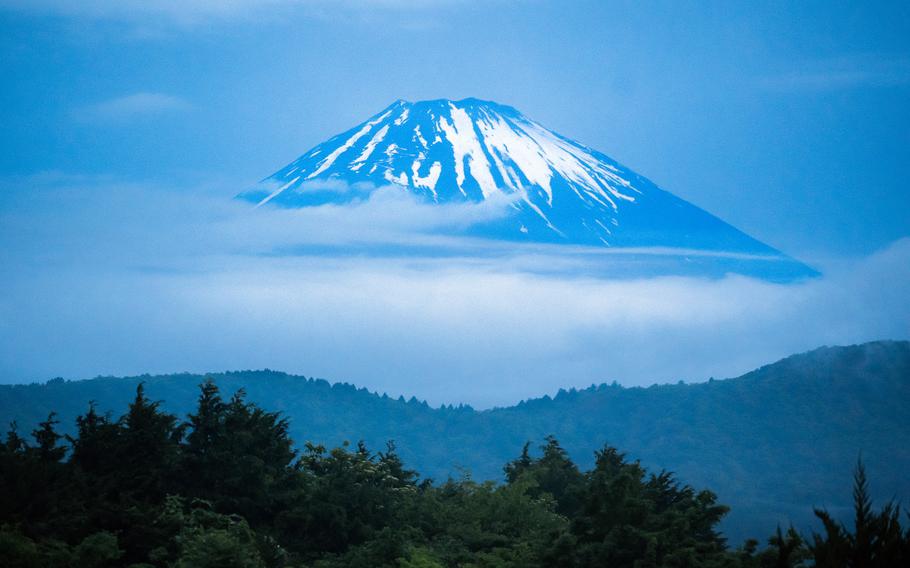 A morning view of Mount Fuji from the mountains surrounding Lake Ashi in Hakone, Japan, May 26, 2025.