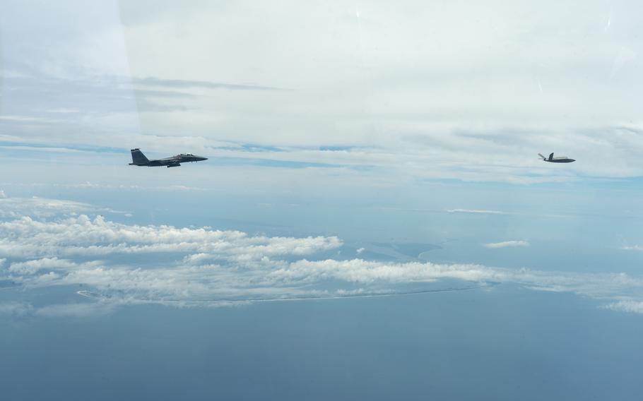 An F-15E Strike Eagle from the 40th Flight Test Squadron at Eglin Air Force Base, Fla., accompanies an XQ-58A Valkyrie flown by artificial intelligence, in an undated photo. The Air Force recently announced that the Valkyrie drone was flown by AI for the first time.  