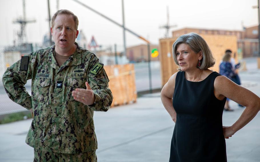 Capt. Colin Corridan, commander of U.S. 5th Fleet’s Task Force 59, speaks with Sen. Joni Ernst, R-Iowa, during a tour of unmanned systems displayed at Naval Support Activity Bahrain, Oct. 8, 2023.