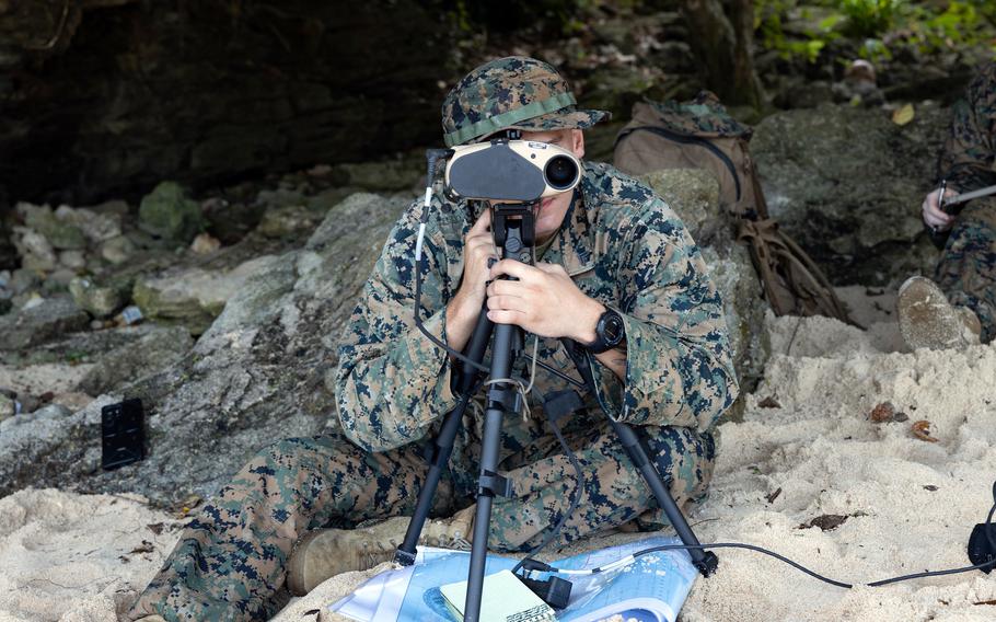 Cpl. Hunter Way of Marine Rotational Force-Southeast Asia searches for vessels of interest in Sorsogon, Philippines, Oct. 9, 2023.