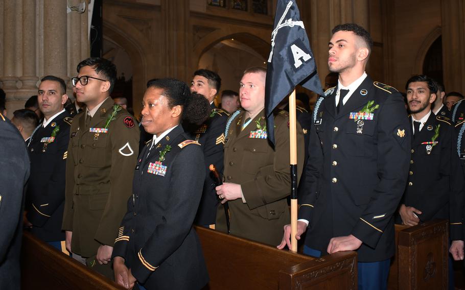 U.S. Army soldiers with the New York National Guard’s 1st Battalion, 69th Infantry Regiment, 27th Infantry Brigade Combat Team, 42nd Infantry Division, wait for mass to begin at the Saint Patrick’s Cathedral in New York, Saturday, March 16, 2024. After mass, the soldiers led the annual New York City St. Patrick’s Day Parade down 5th Avenue.