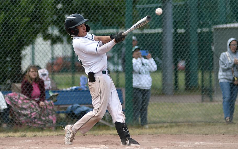 Naples senior Matt Butler swings at a high pitch during the Division II/III final against Vicenza at the 2025 DODEA European baseball championships on May 23, 2025, at Southside Fitness Center on Ramstein Air Base, Germany.