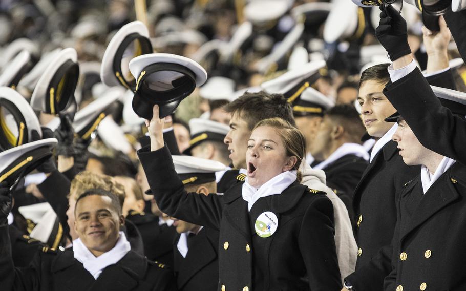 Navy Academy Midshipmen raise a cheer for their team during a timeout in the 123rd Army-Navy football game played at at Philadelphia’s Lincoln Financial Field on Saturday, Dec. 10, 2022.