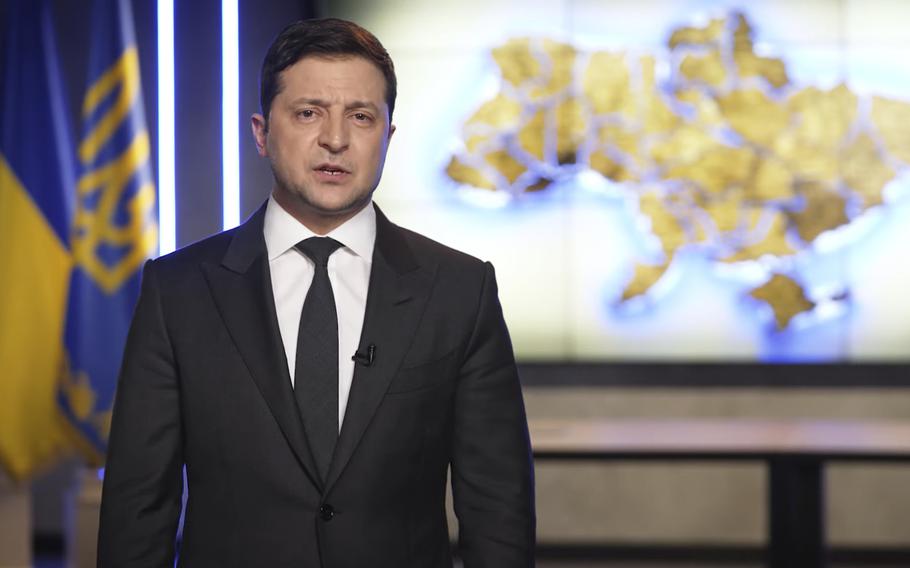 In this handout photo taken from video provided by the Ukrainian Presidential Press Office, Ukrainian President Volodymyr Zelenskyy addresses the nation in Kyiv, Ukraine, Feb. 24, 2022. 