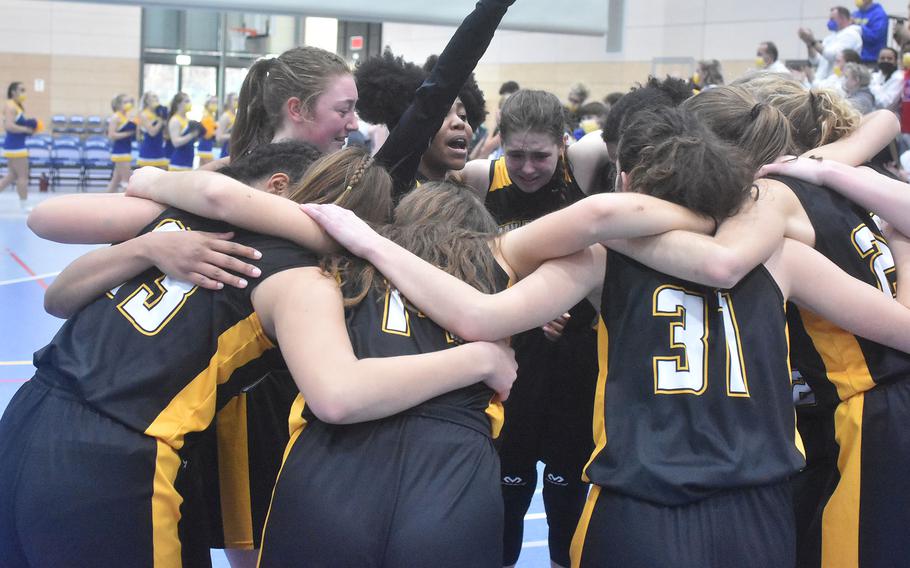 The Stuttgart Panthers celebrate after winning the DODEA-Europe Division I girls title Saturday, Feb. 26, 2022 at Ramstein High School in Germany.