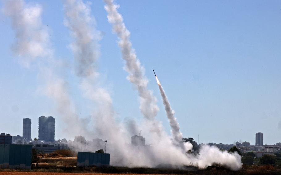 Israel's Iron Dome aerial defense system is activated to intercept a rocket launched from the Gaza Strip, controlled by the Palestinian Hamas movement, above the southern Israeli city of Ashdod, on May 12, 2021.