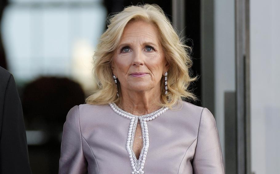 First lady Jill Biden waits with President Joe Biden to greet South Korea’s first lady Kim Keon Hee and South Korea’s President Yoon Suk Yeol on the North Portico of the White House in Washington ahead of a State Dinner, April 26, 2023. Jill Biden will promote women and youth empowerment, and attend a Jordanian royal wedding, during an upcoming trip to the Middle East, North Africa and Europe. The first lady’s office says she’ll depart on a six-day trip that will take her to Jordan, Egypt, Morocco and Portugal. 