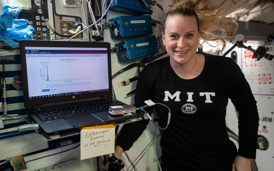 NASA astronaut and Expedition 64 flight engineer Kate Rubins is pictured during DNA sequencing activities aboard the International Space Station, Jan. 22, 2021, for an experiment that seeks to diagnose medical conditions and identify microbes. Just months after completing her second space mission, Rubins has been commissioned in the U.S. Army Reserve.