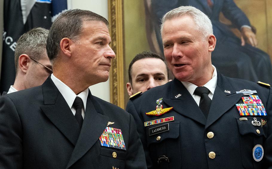 Navy Adm. John Aquilino, left, commander of U.S. Indo-Pacific Command, and Army Gen. Paul J. LaCamera, commander of U.S. Forces Korea/Combined Forces Command/United Nations Command, prepare to testify at a House Armed Services Committee hearing in Washington on Wednesday, March 20, 2024. 
