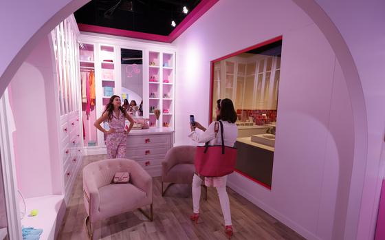 Guests attend the World Of Barbie, Los Angeles opening press preview, at Santa Monica Place on April 12 in Santa Monica, Calif.  At the recently expanded exhibition, guests can visit life-size recreations of Barbie’s beach house, camper van and more.