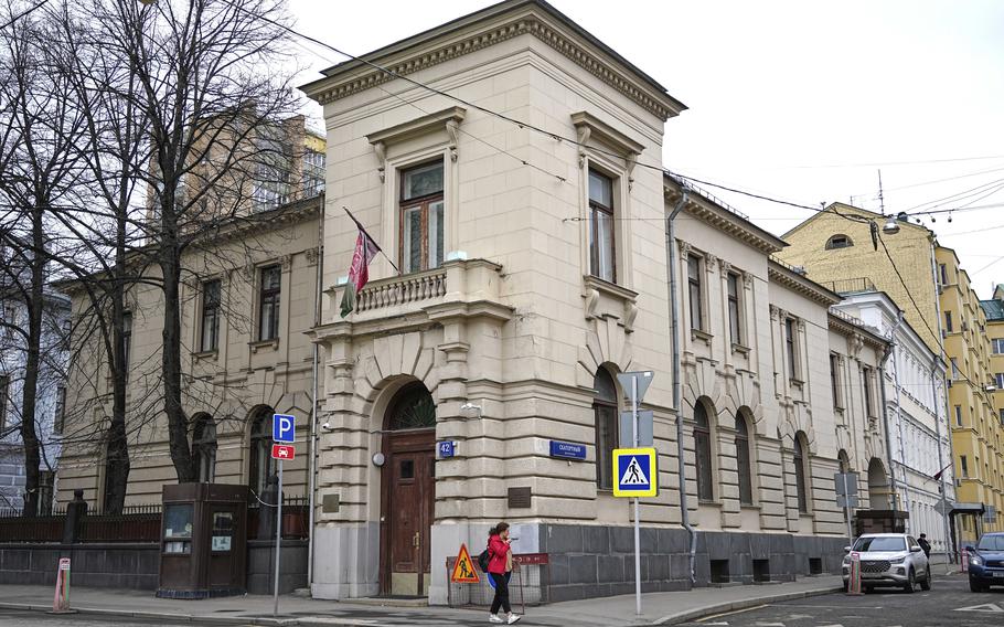 A building on a street corner.