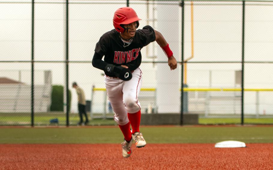 Kinnick's Jaden DeCastro breaks from second base to third.