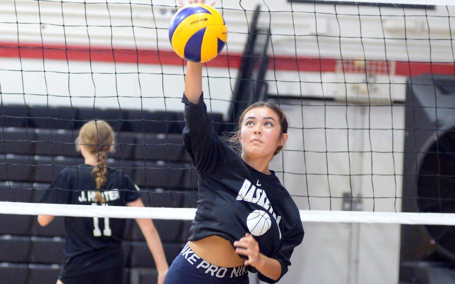 Kira Herring hits the ball.
