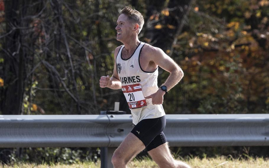 Marine Corps Capt. Kyle King looks ahead toward the finish line in the final portion of the Marine Corps Marathon Sunday in Arlington, Va.