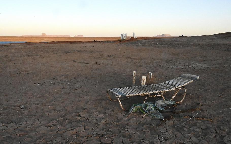 In an area near Wahweap Marina that was previously underwater at Lake Powell, the earth is dry and cracked on April 5, 2022, in Page, Arizona. 