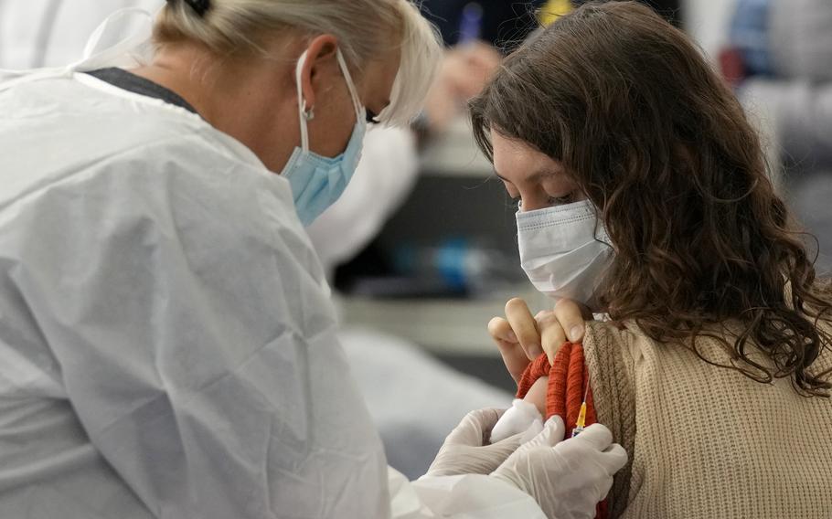 A woman from Russia is administered a dose of the Johnson COVID-19 vaccine in Zagreb, Croatia, Tuesday, Nov. 9, 2021.