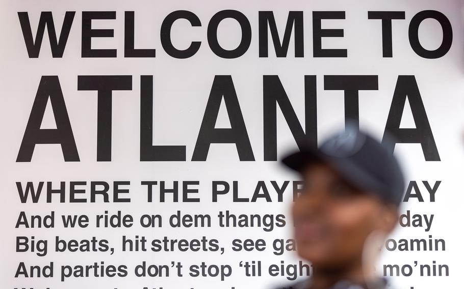 The lyrics to Jermaine Dupri’s “Welcome to Atlanta,” featuring Ludacris, are seen on the door to the main room of the hip-hop pop-up experience at Underground Atlanta. 