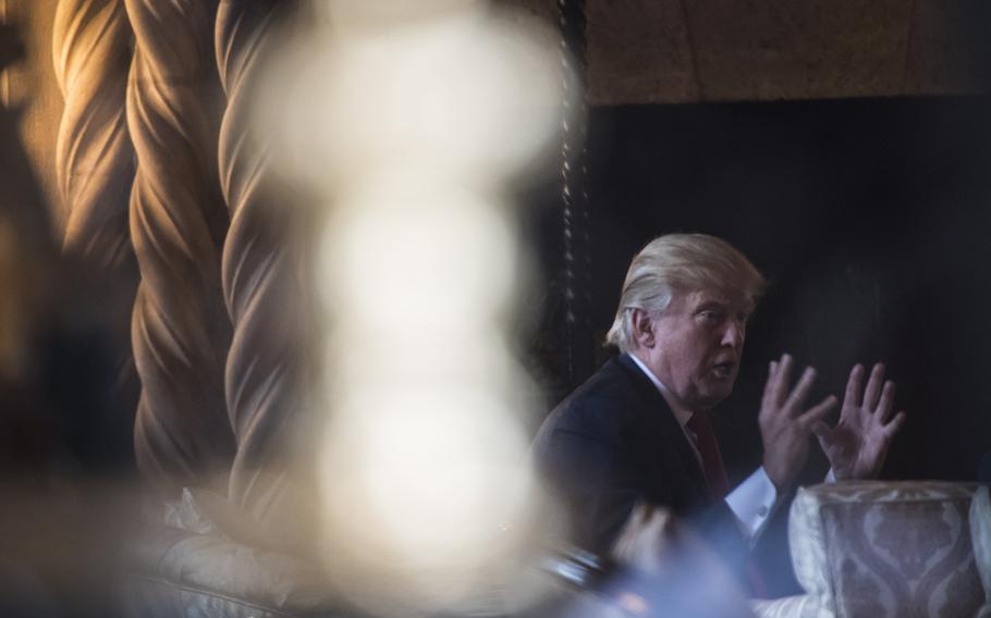 Then-President-Elect Donald Trump attends a meeting at the Mar-a-Lago Club in Palm Beach, Fla., in December 2016.