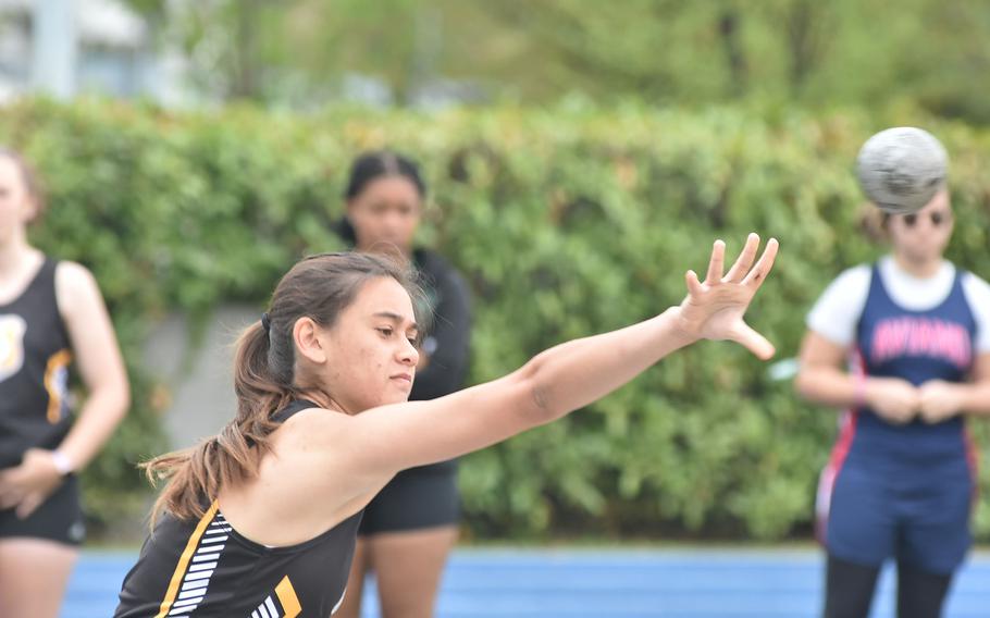 Vicenza's Chansayrai Owen sends the shot put away from her during a DODEA-Europe track meet Saturday, April 23, 2022 in Pordenone, Italy.