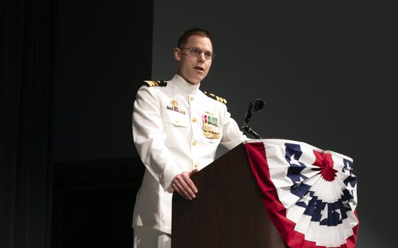 Cmdr. Michael Lyle, seen here at a change-of-command ceremony in August 2022, was fired from the command of the USS Alabama's blue crew on Sept. 23, 2023. 