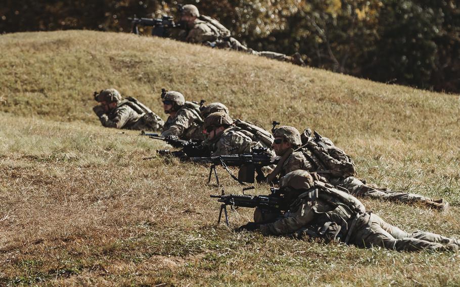 U.S. Soldiers with Bravo Company, 1st Battalion, 112th Infantry Regiment, 56th Stryker Brigade Combat Team perform a platoon maneuver exercise at Fort Barfoot, Va., Oct. 25, 2023.
