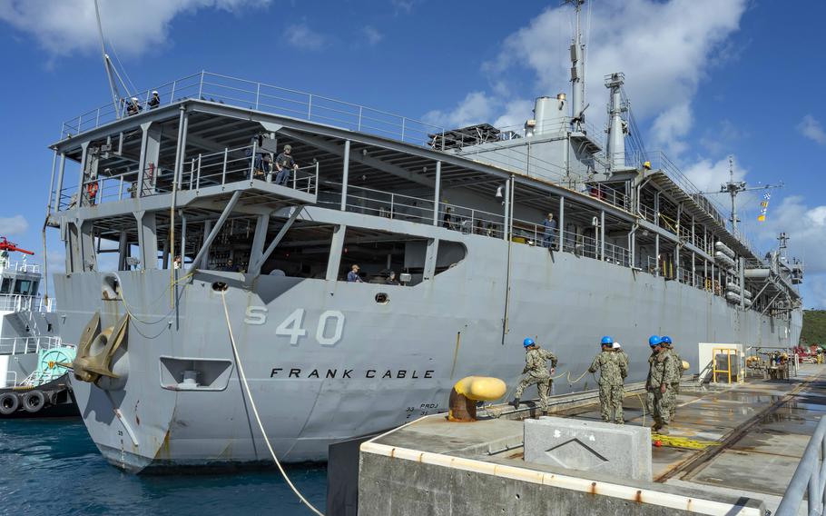 The submarine tender USS Frank Cable arrives at White Beach Naval Facility, Okinawa, Dec. 6, 2021.