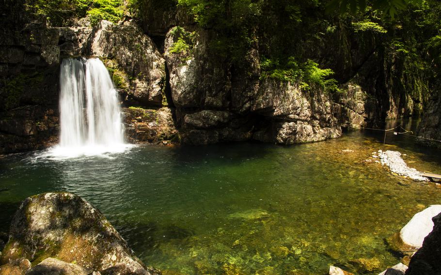 The Nidandaki waterfall in Hiroshima prefecture, Japan, is accessible only by a small boat service through a narrow gorge. 