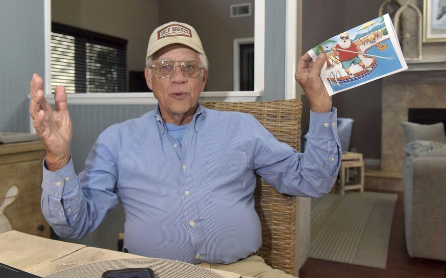 Gulf Breeze, Fla., businessman Mike Esmond talks, Wednesday, Dec. 15, 2021, about why he continues his tradition of paying past-due utility bills for Gulf Breeze residents.