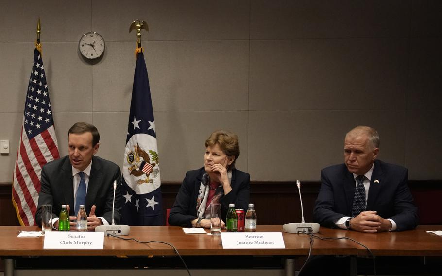 Sen. Chris Murphy, D-Conn., second left, speaks during a news conference with Sen. Jeanne Shaheen, D-N.H., second right, Sen. Thom Tillis, R-N.C., right, in the U.S. embassy in Belgrade, Serbia, on April 19, 2022. The Senate delegation urged Serbia to join the rest of Europe and impose sanctions against Russia for its unprovoked war in Ukraine. 