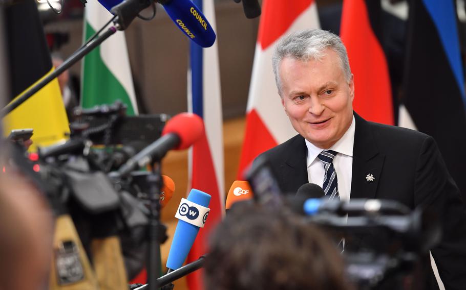 Gitanas Nauseda, Lithuania's president, speaks to journalists as he arrives for a European Union leaders summit in Brussels on Feb. 20, 2020. MUST CREDIT: Bloomberg photo by Geert Vanden Wijngaert.