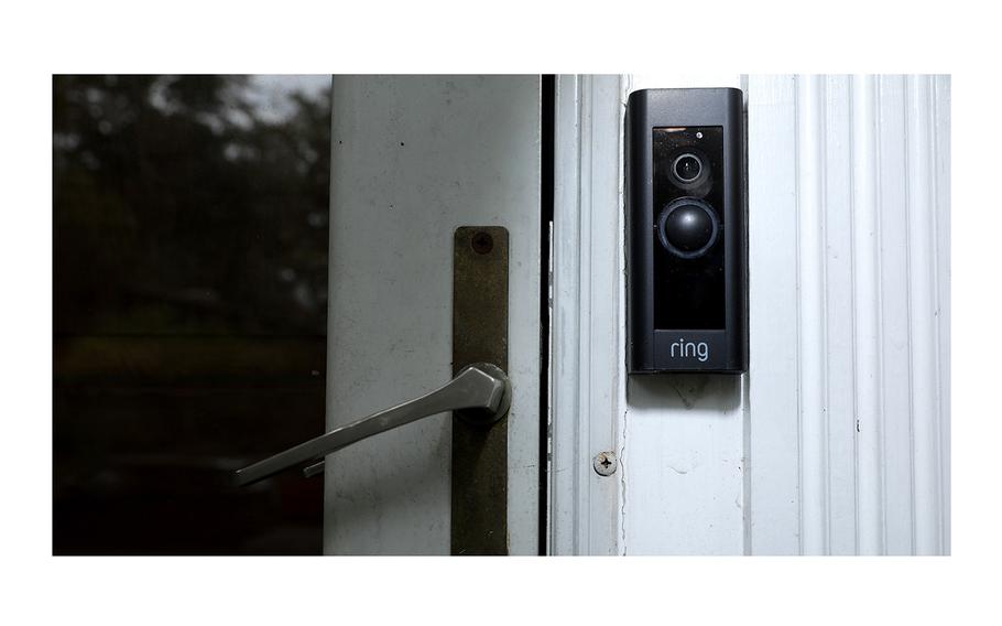 A doorbell device with a built-in camera made by home security company Ring is seen on Aug. 28, 2019, in Silver Spring, Md. These devices allow users to see video footage of who is at their front door when the bell is pressed or when motion activates the camera. 