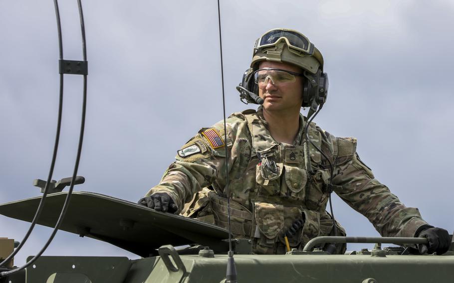 Staff Sgt. Lendon Head, 1st Battalion, 77th Field Artillery Regiment, 41st Field Artillery Brigade, monitors vehicle movement while preparing for a live-fire exercise at Novo Selo, Bulgaria, June 1, 2021.