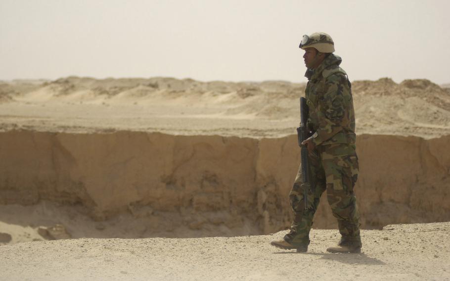 A soldier inspects quarries in Iraq