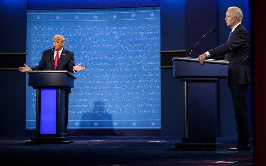Then-President Donald Trump and Democratic presidential candidate Joe Biden participate in the final presidential debate on the campus of Belmont University on Oct. 22, 2020, in Nashville. 