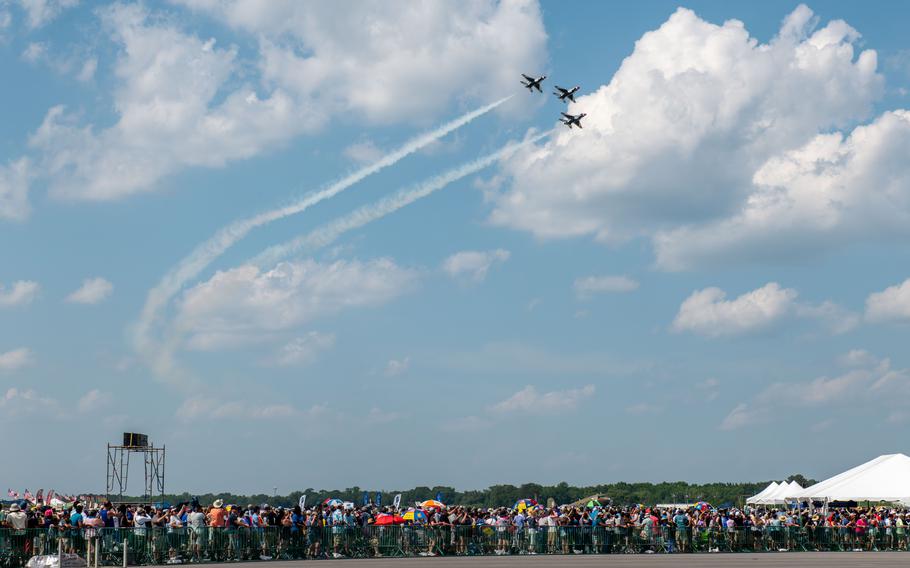 Attendees at the Charleston Airshow watch three United States Air Force Demonstration “Thunderbirds” F-16 Fighting Falcons perform an aerial demonstration during the Charleston Airshow at Joint Base Charleston, S.C., Saturday, April 20, 2024. 