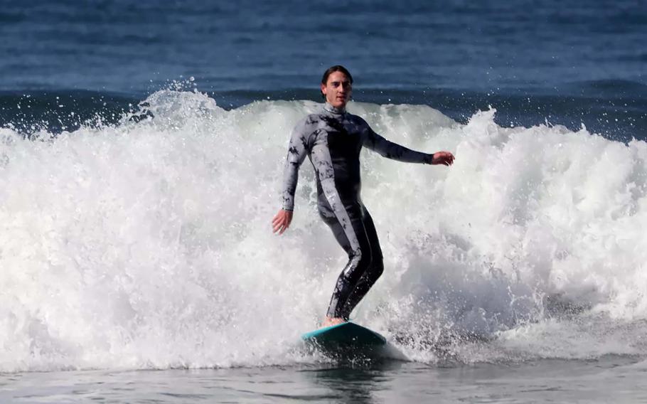 Lawrence Doherty catches a wave in Malibu. 