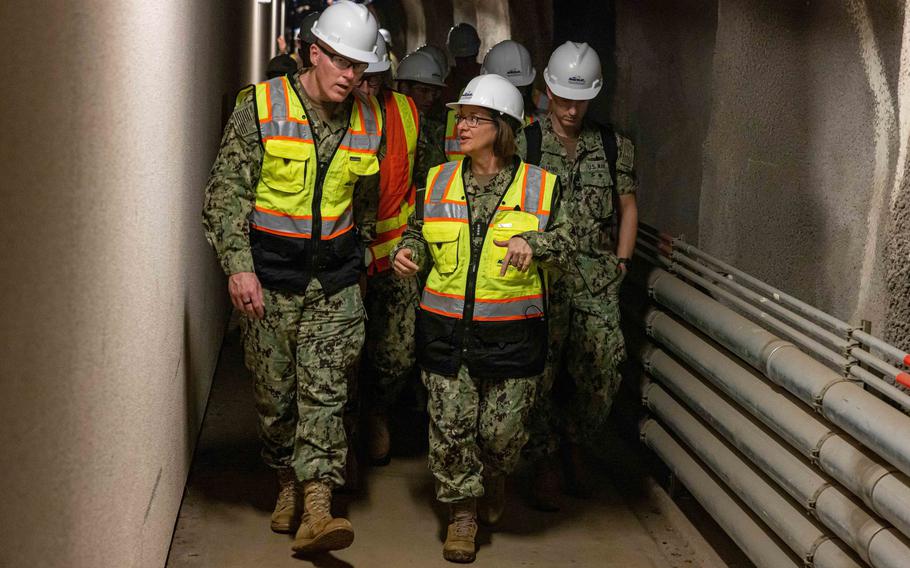 Joint Task Force Red Hill Commander Vice Admiral John Wade speaks with Vice Chief of Naval Operations Adm. Lisa M. Franchetti during a site visit to the Red Hill Bulk Fuel Storage Facility in December 2022. 
