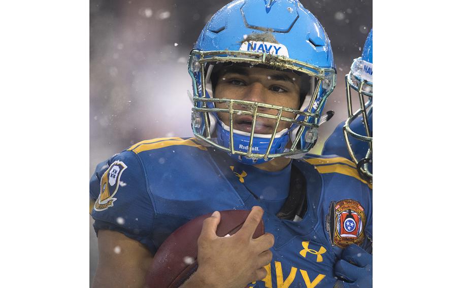 Navy running back Malcolm Perry reacts after a touchdown in the second quarter of the 118th Army-Navy Game in Philadelphia on Dec. 9, 2017.