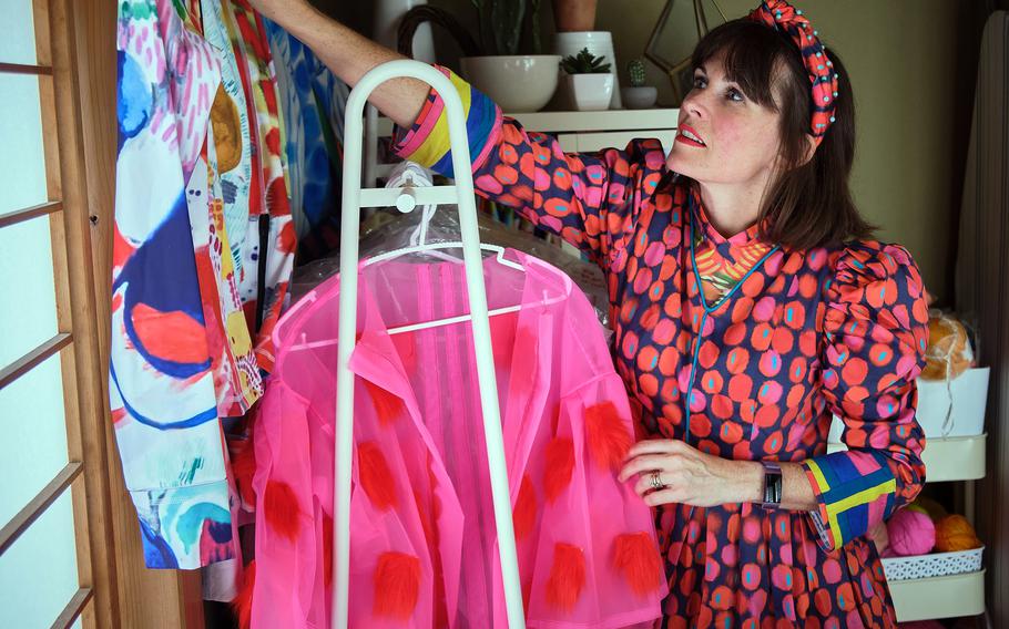 Navy spouse Katie Kortman shows off her home design studio at Yokosuka Naval Base, Japan, Sept. 30, 2021. She is a contestant on the upcoming season of Bravo's fashion competition series "Project Runway."