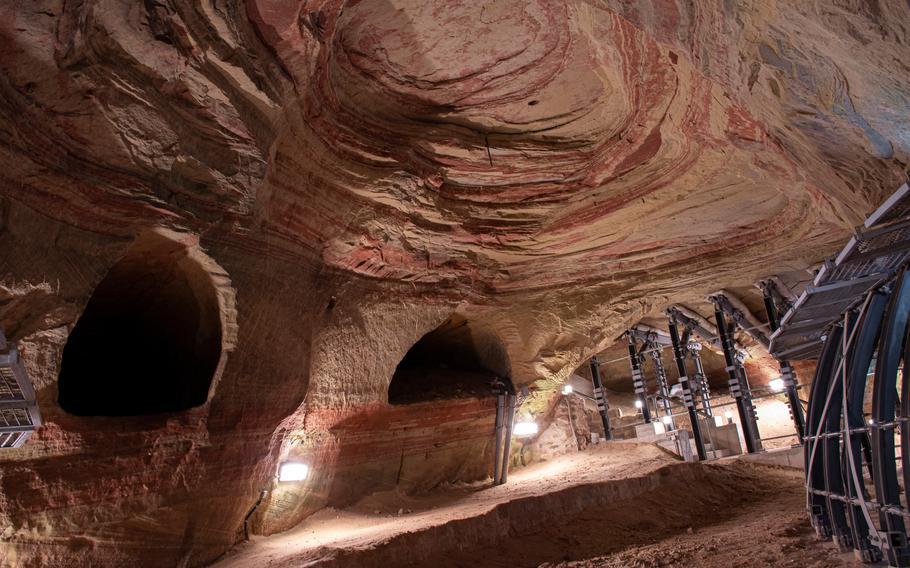 Red-and-yellow sandstone is seen in the first domed area visitors come across upon entering the Schlossberg Caves in Homburg, Germany.