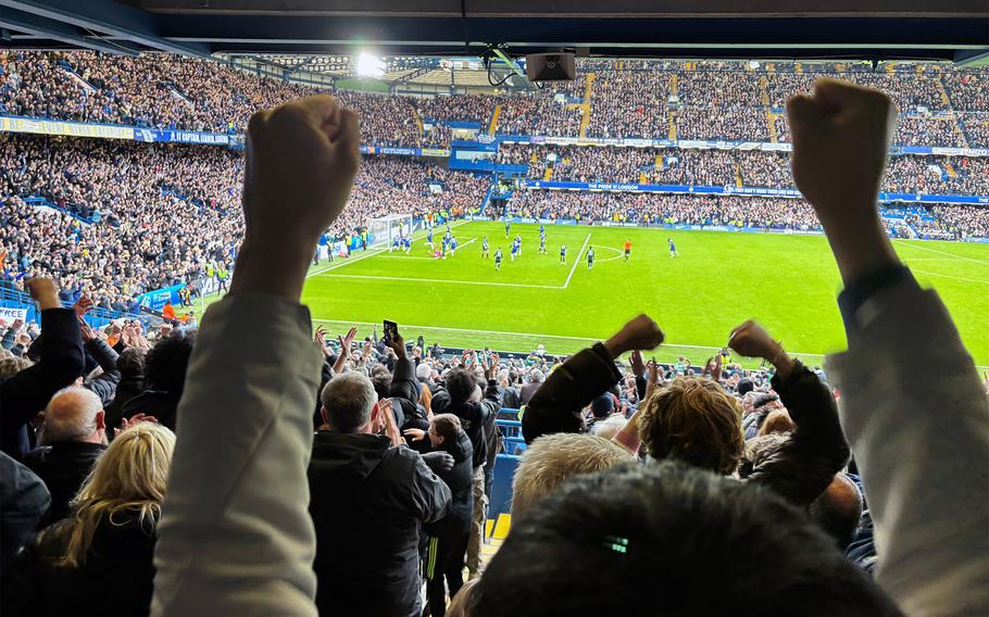 Chelsea fans celebrate as their team takes on Leicester City in the FA Cup quarterfinal at Stamford Bridge in London on Sunday, March 17, 2024.