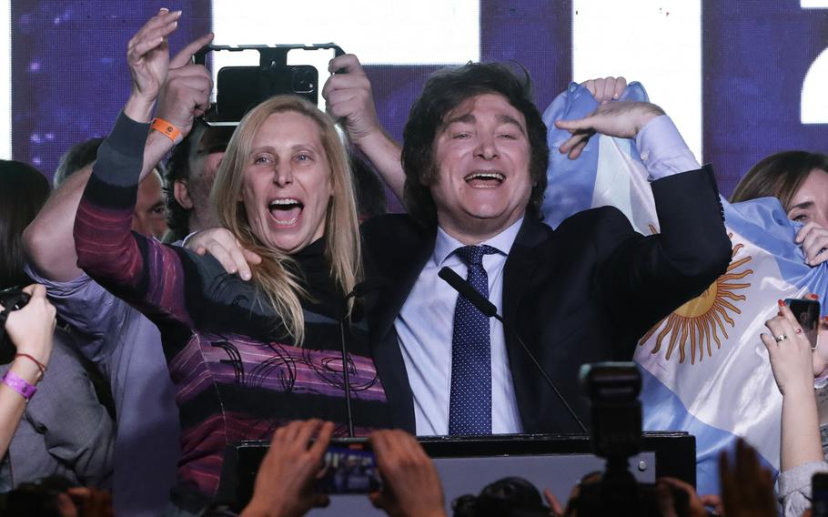 Argentina far-right libertarian economist and presidential candidate Javier Milei celebrates the results of the primary elections with his sister Karina Milei at Milei’s headquarters in Buenos Aires on Aug. 13, 2023.
