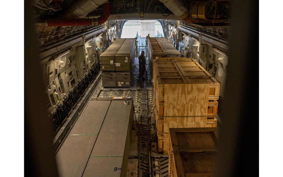 Weapons cargo bound for Ukraine sits on a C-17 Globemaster III during a security assistance mission at Dover Air Force Base, Del., Aug. 19, 2022. 