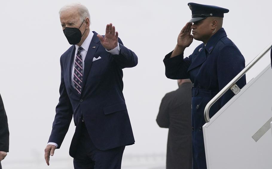 President Joe Biden waves as he steps off Air Force One upon arrival, at John F. Kennedy Airport, Thursday, Feb. 3, 2022, in the Queens Borough of New York. 