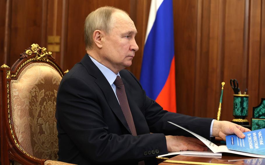 Putin at a meeting with the Minister of Economic Development Maxim Reshetnikov.