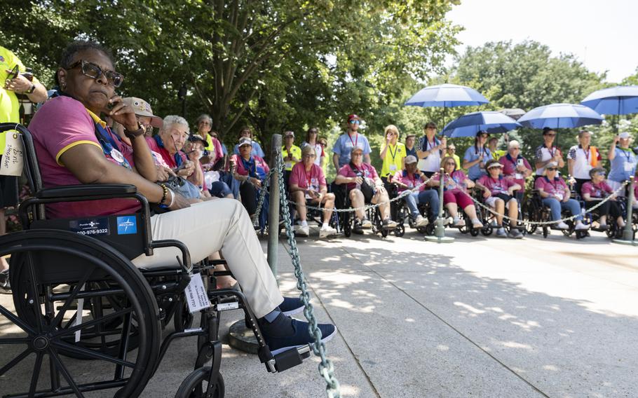 Female veterans sit in a group together